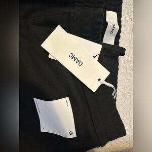 Black OAMC logo-patch cotton track pants LARGE